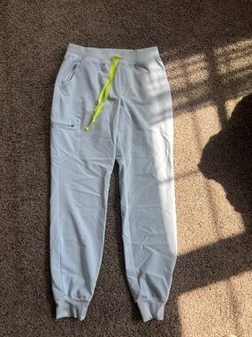 Figs Women's Light Blue Jogger Scrub Pants with Neon Yellow Drawstring